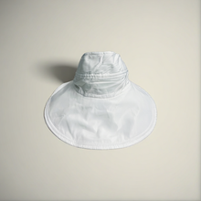 Load image into Gallery viewer, The image displays a Plaid  Vintage Check Bonnet Cap.
